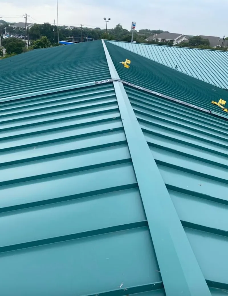 Green commercial metal roof ridge and valley for Metal Roof Repair in Rockton