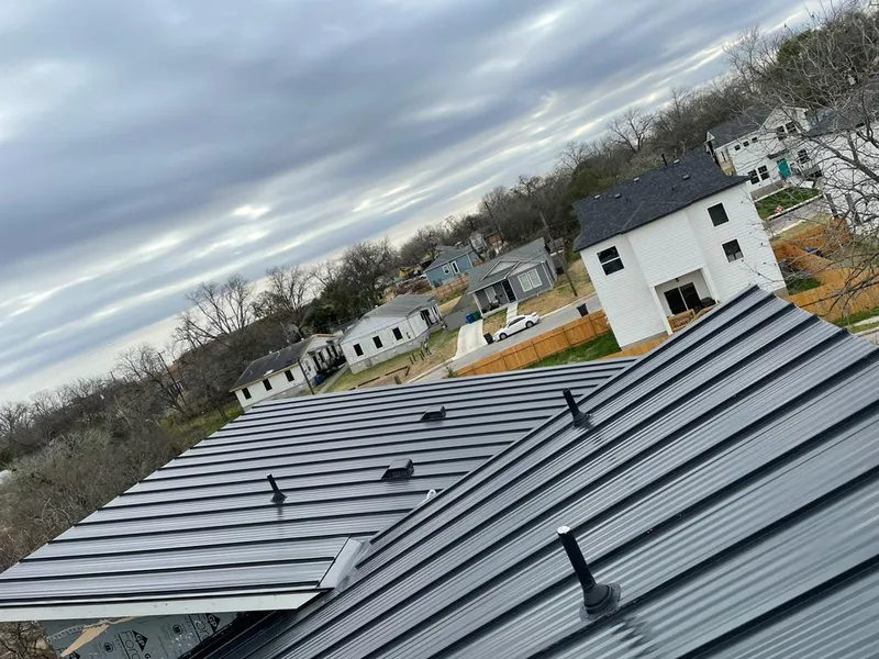 Standing seam metal roof panels with vents for Skylight Repair in Rockton